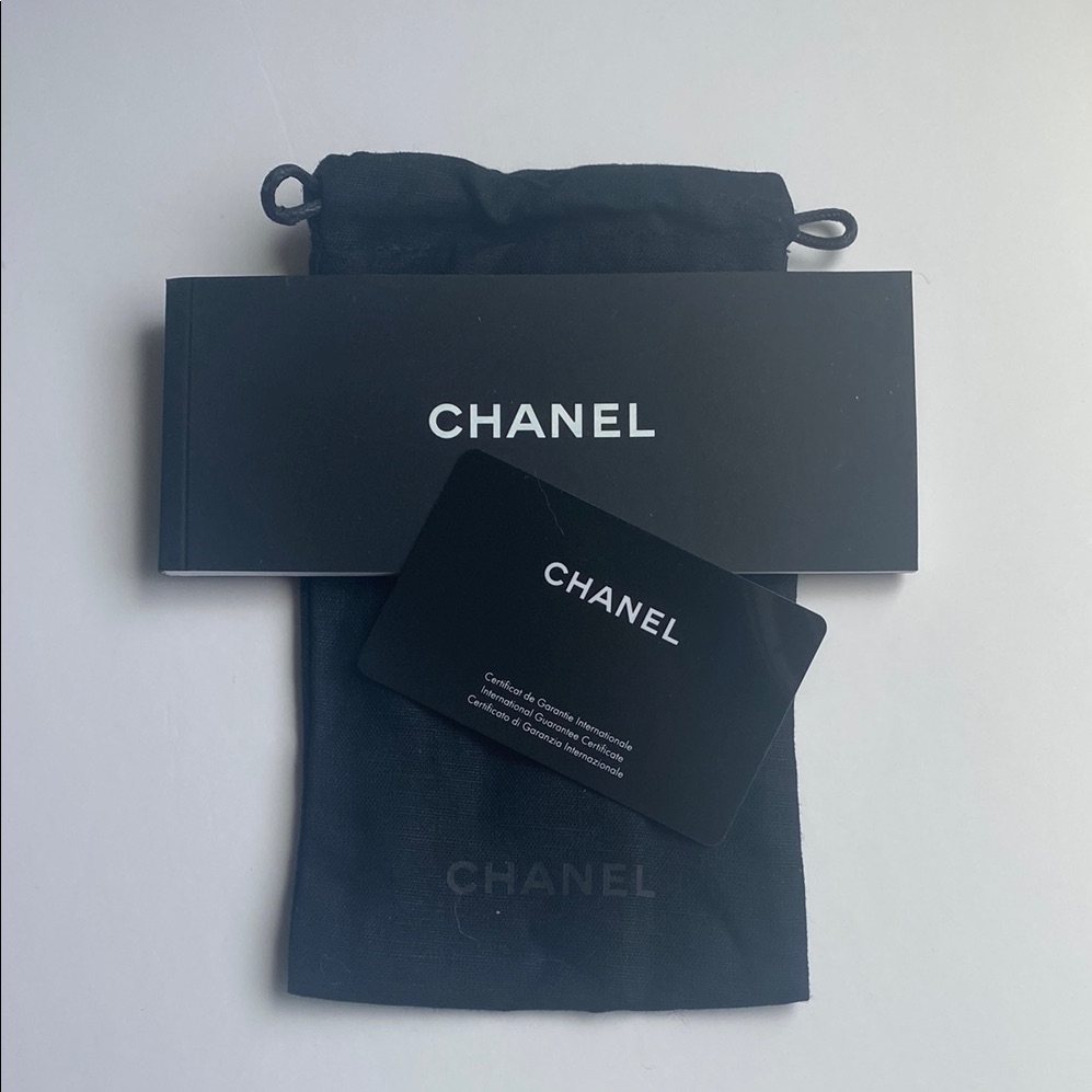 Chanel Black Drawstring Pouch With Authenticity Booklet And Card